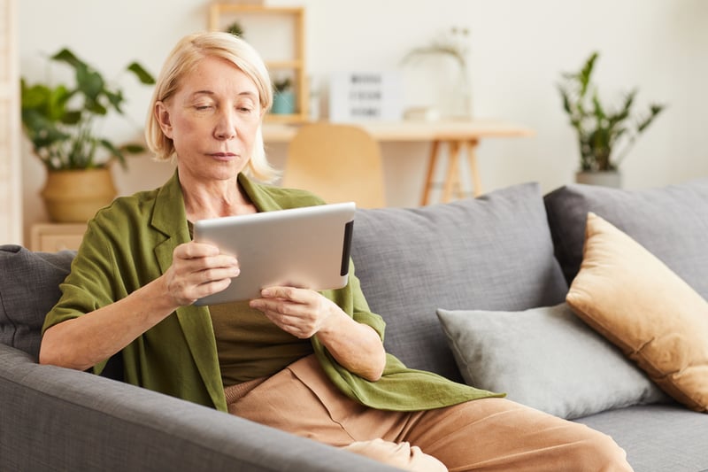older-woman-on-tablet-searching-for-local-doctor