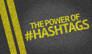 The Power Of Hashtags written on the road.jpeg