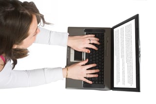 woman-blog-social-media-dental-marketing-plan-laptop-screen.jpeg